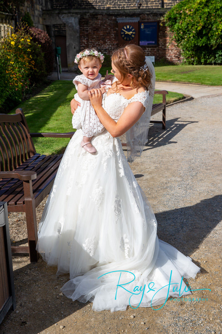 Bride and daughter, flower girl together 