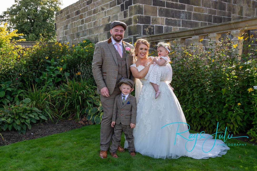 Bride, groom and children family portrait