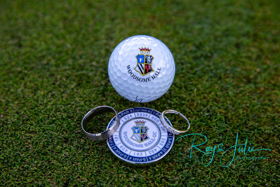 Woodsome Hall golf ball and marker with wedding rings