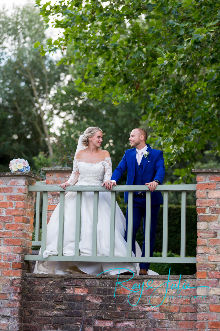 Bride and Groom having an intimate glance at each other, captured at Saltmarshe Hall after their outdoor wedding ceremony.