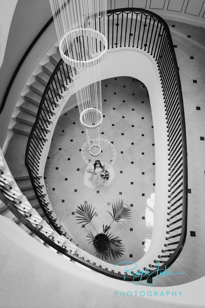 Beautiful bride inside Grantley Hall with spiral staircase