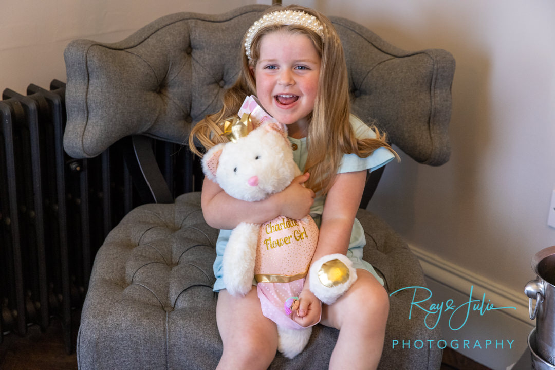 Flower girl with teddy