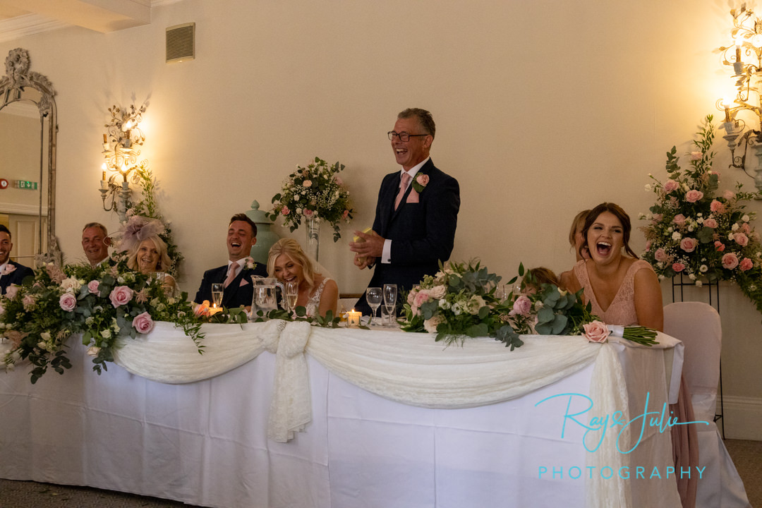 Wedding speech everyone on the top table laughing