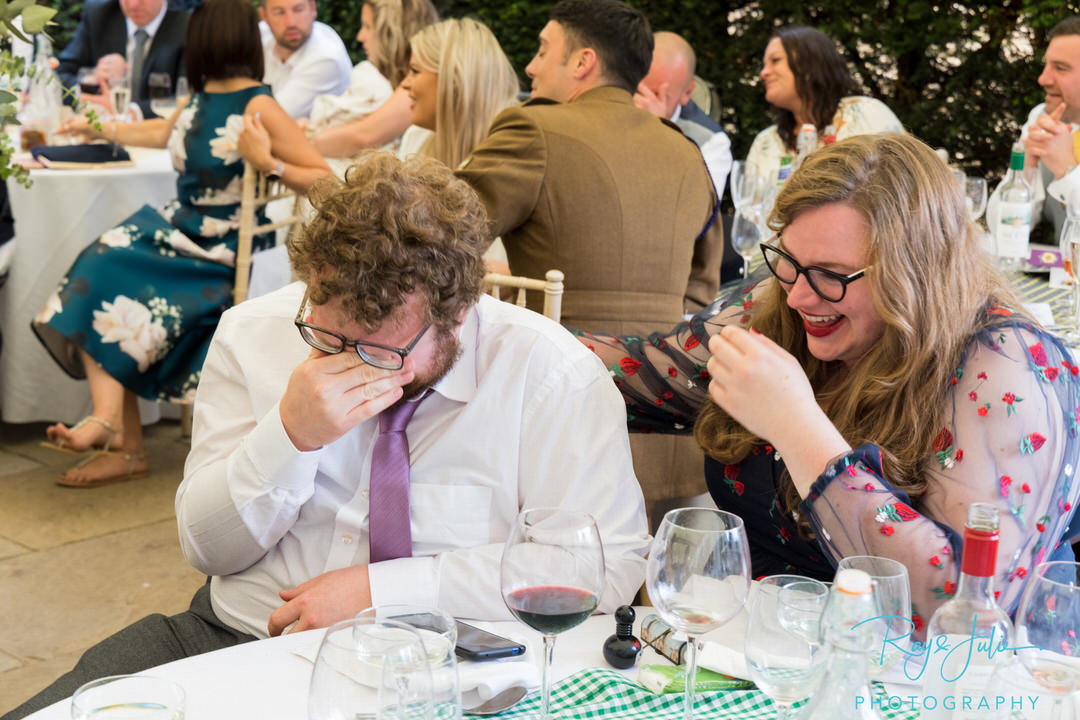 Guests laughing during speeches - Yorkshire wedding photographer